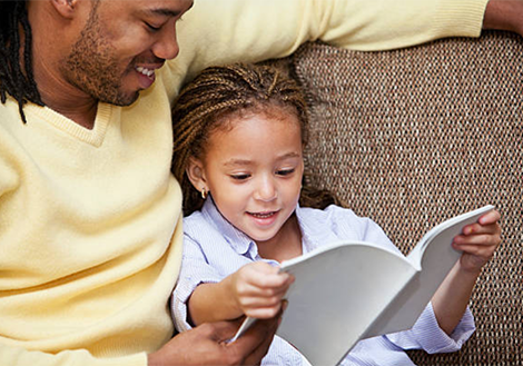 father-and-daughter-reading-together_orig